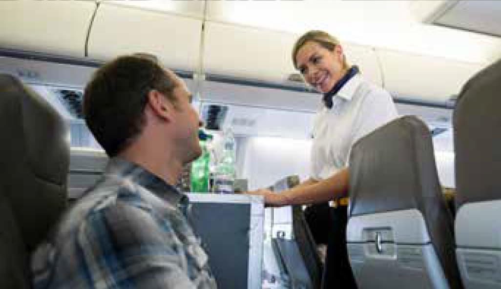 Stewardese serving customers